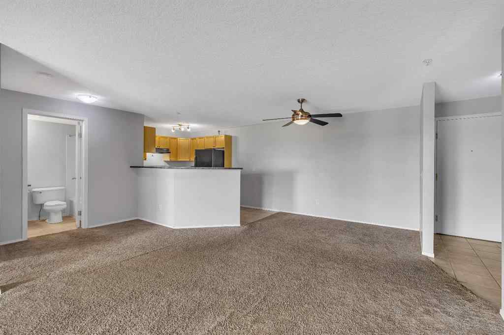 MLS® A2242213 - Unit #6307 304 Mackenzie Way SW in Downtown Airdrie, Residential