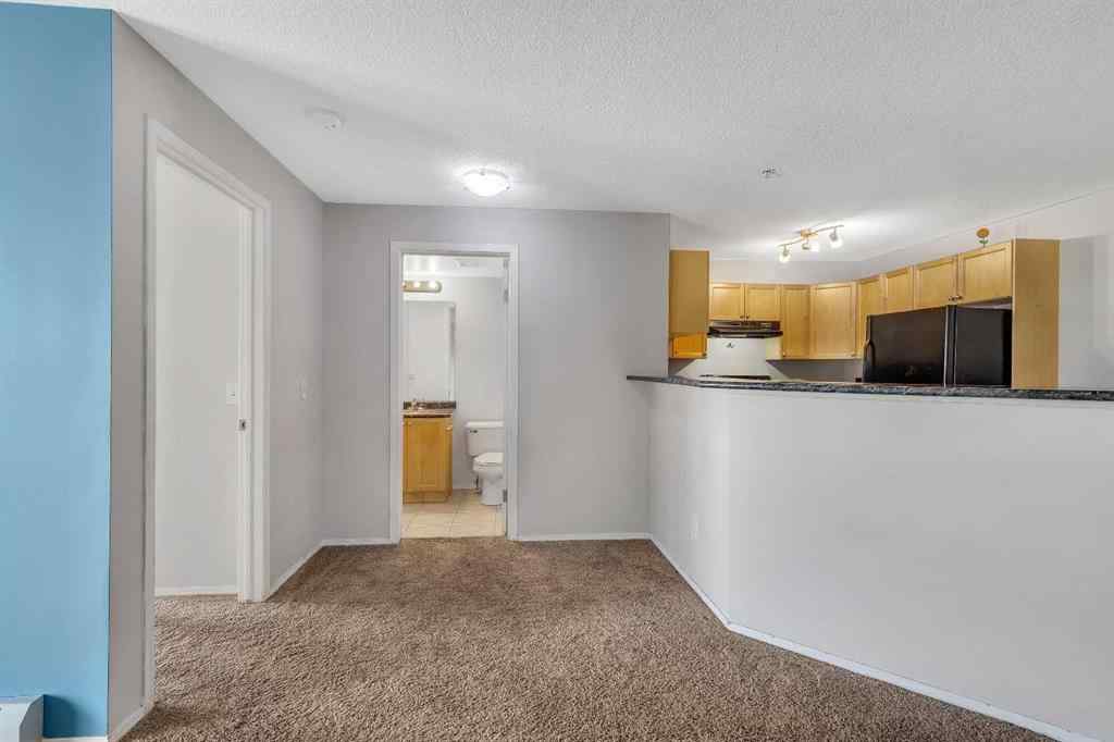 MLS® A2242213 - Unit #6307 304 Mackenzie Way SW in Downtown Airdrie, Residential