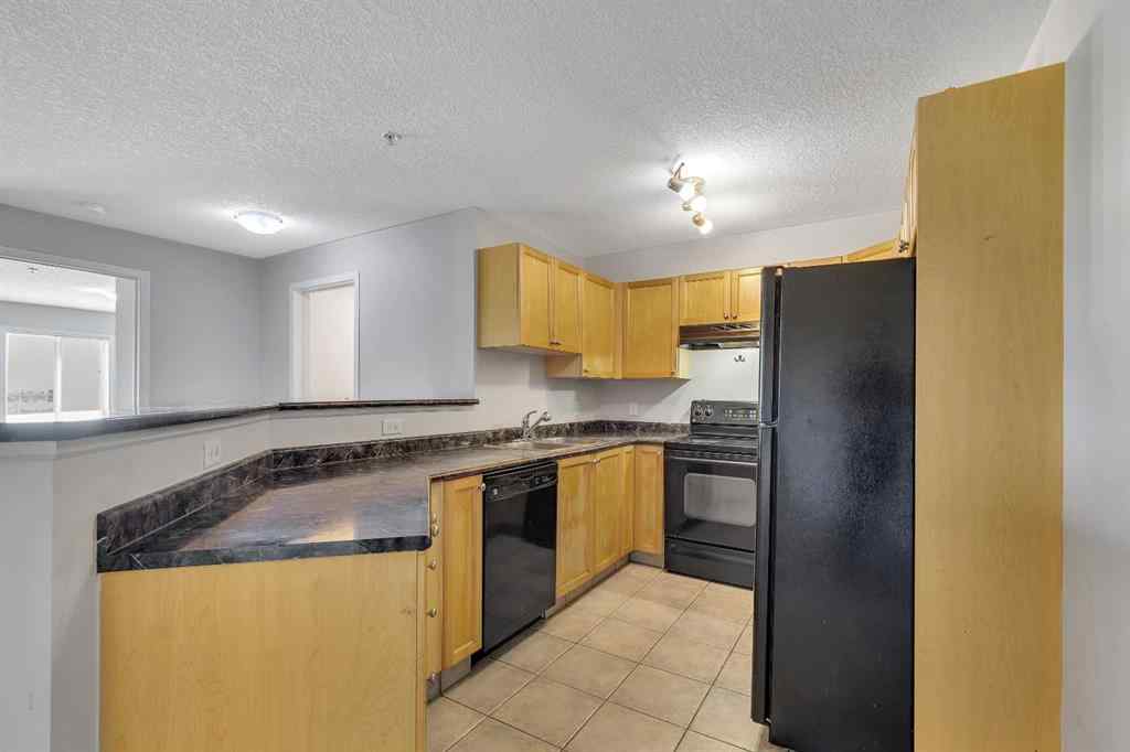MLS® A2242213 - Unit #6307 304 Mackenzie Way SW in Downtown Airdrie, Residential