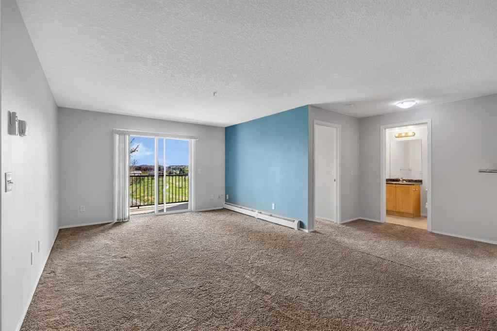 MLS® A2242213 - Unit #6307 304 Mackenzie Way SW in Downtown Airdrie, Residential