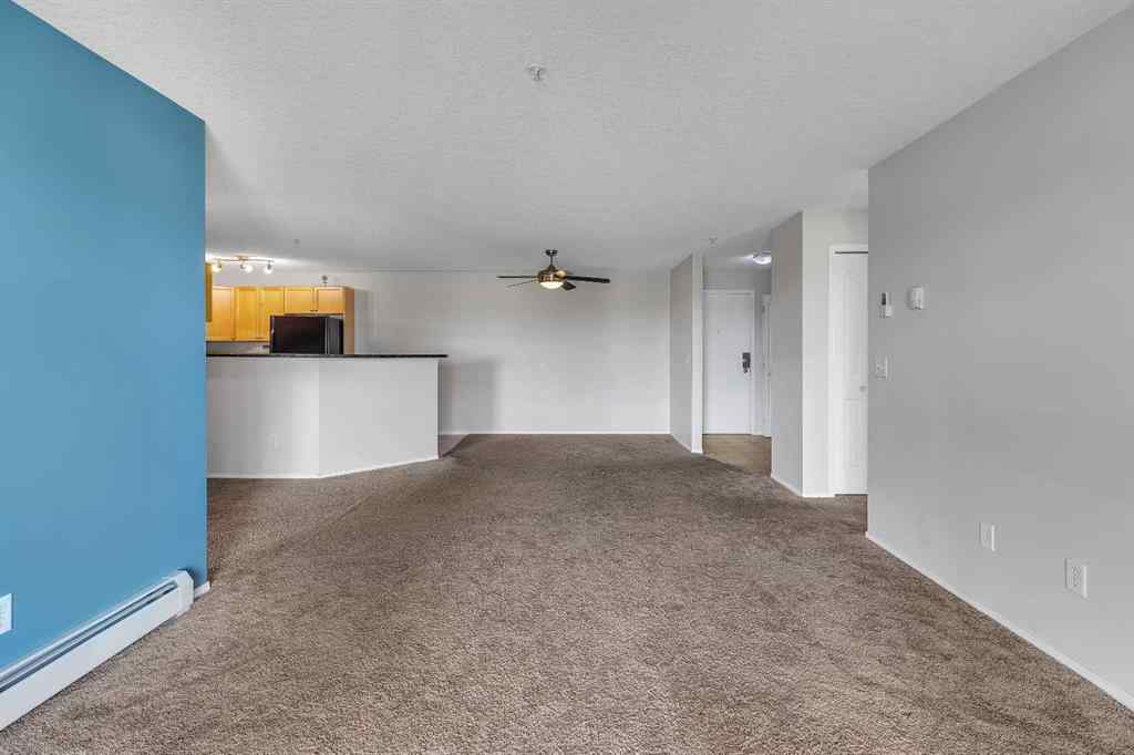 MLS® A2242213 - Unit #6307 304 Mackenzie Way SW in Downtown Airdrie, Residential
