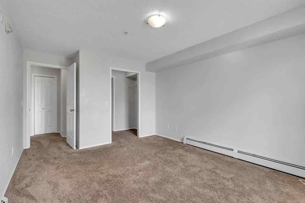 MLS® A2242213 - Unit #6307 304 Mackenzie Way SW in Downtown Airdrie, Residential