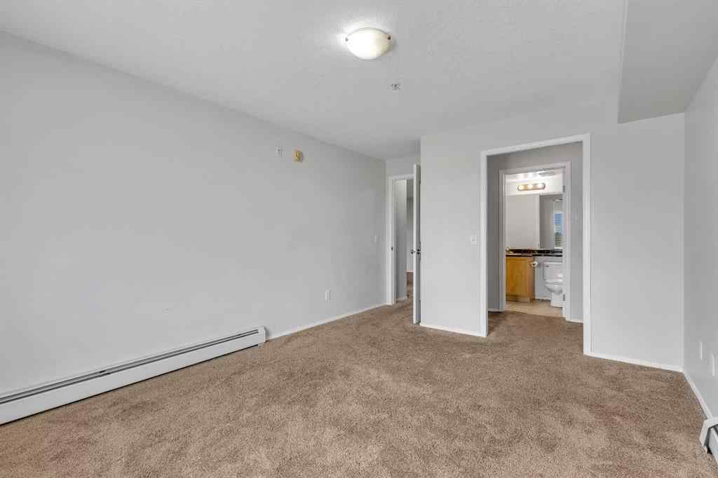 MLS® A2242213 - Unit #6307 304 Mackenzie Way SW in Downtown Airdrie, Residential