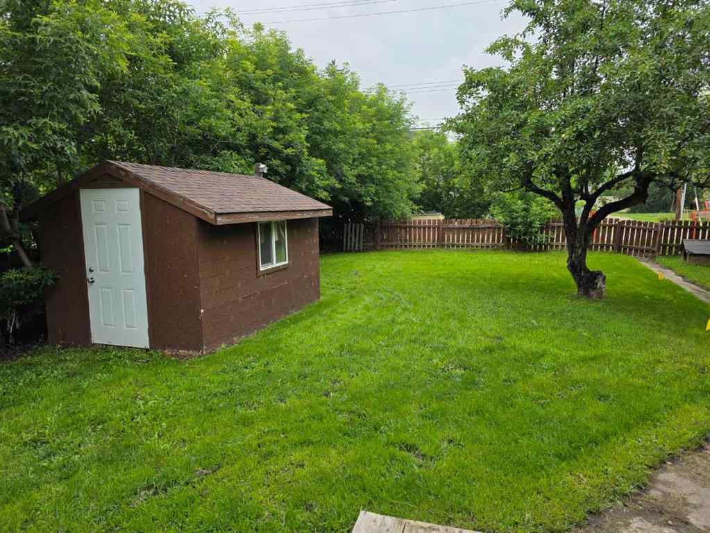 MLS® A2242251 - 4910 Hwy 2A   in Downtown Lacombe Lacombe, Residential