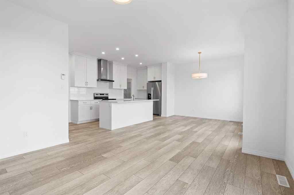MLS® A2242282 - 310 Montrose Crescent SE in Montrose High River, Residential