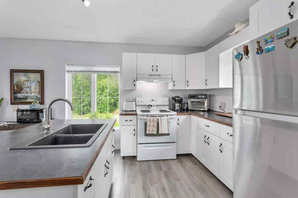 MLS® A2242296 - Unit #10 6138 Highway 584   in NONE Rural Mountain View County, Residential
