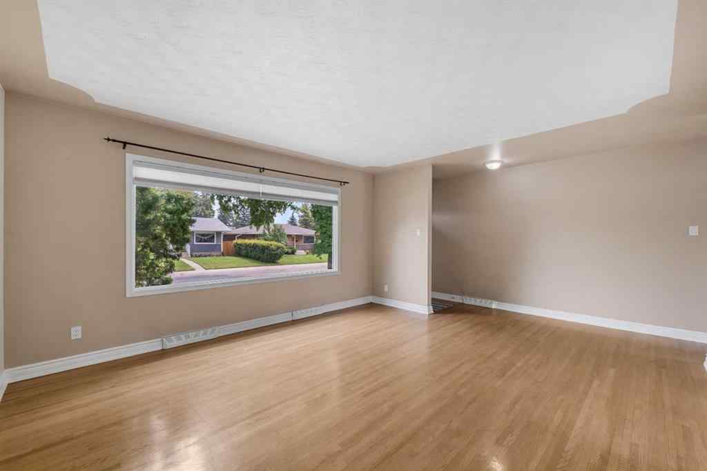 MLS® A2242305 - 8527 Athabasca Street SE in Acadia Calgary, Residential