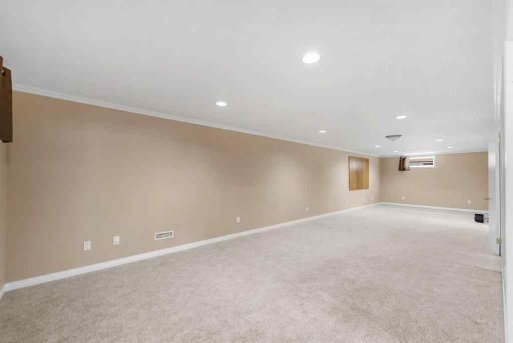 MLS® A2242305 - 8527 Athabasca Street SE in Acadia Calgary, Residential