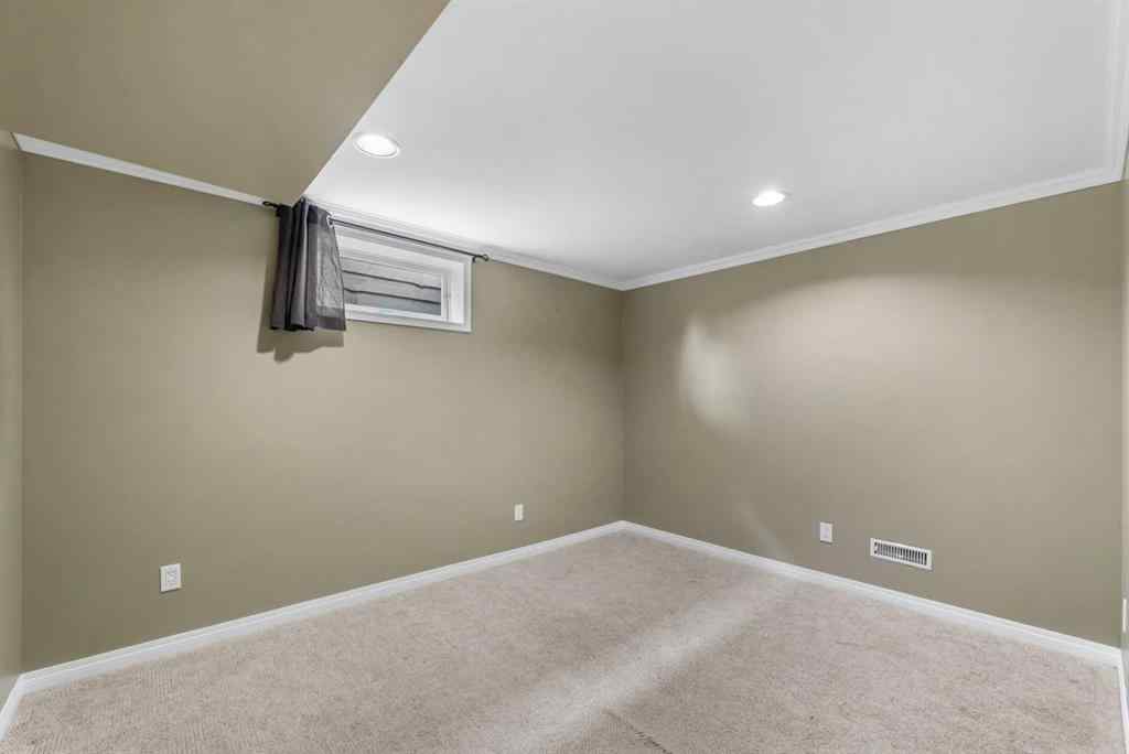 MLS® A2242305 - 8527 Athabasca Street SE in Acadia Calgary, Residential