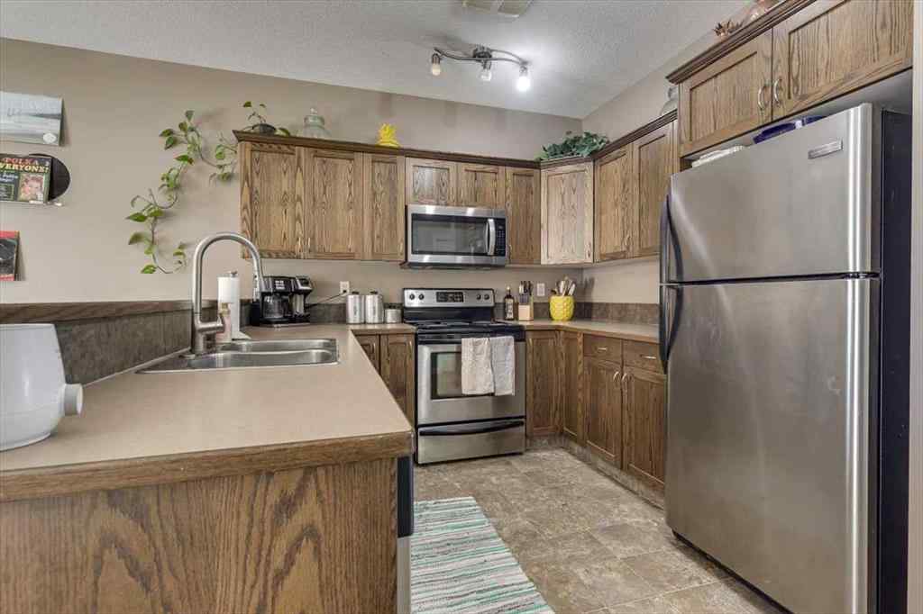 MLS® A2242353 - Unit #110 50 Lucky Place  in Lakeway Landing Sylvan Lake, Residential