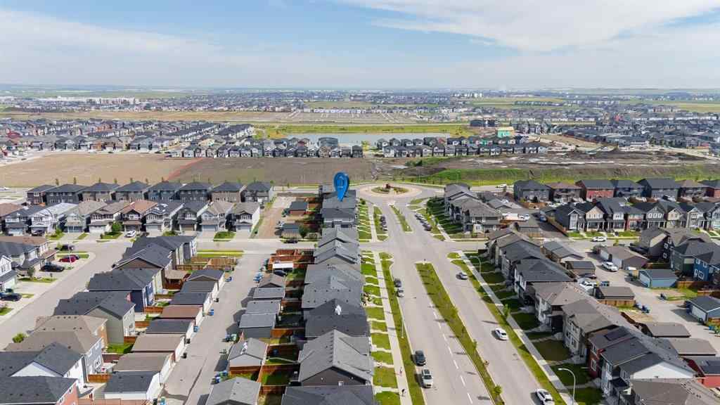 MLS® A2242367 - 9117 52 Street NE in Saddle Ridge Calgary, Residential