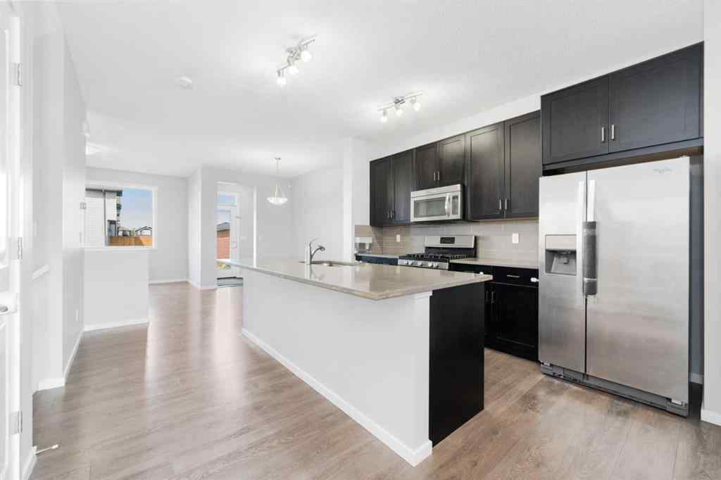 MLS® A2242367 - 9117 52 Street NE in Saddle Ridge Calgary, Residential