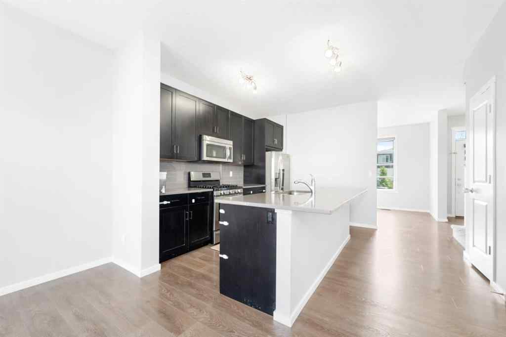 MLS® A2242367 - 9117 52 Street NE in Saddle Ridge Calgary, Residential