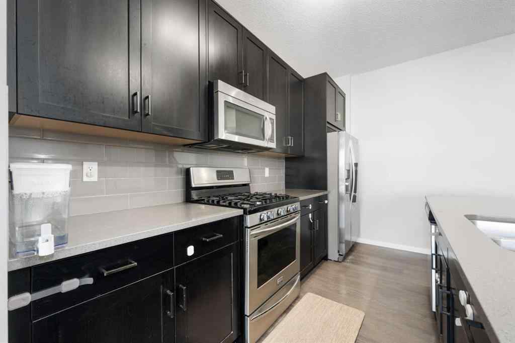 MLS® A2242367 - 9117 52 Street NE in Saddle Ridge Calgary, Residential