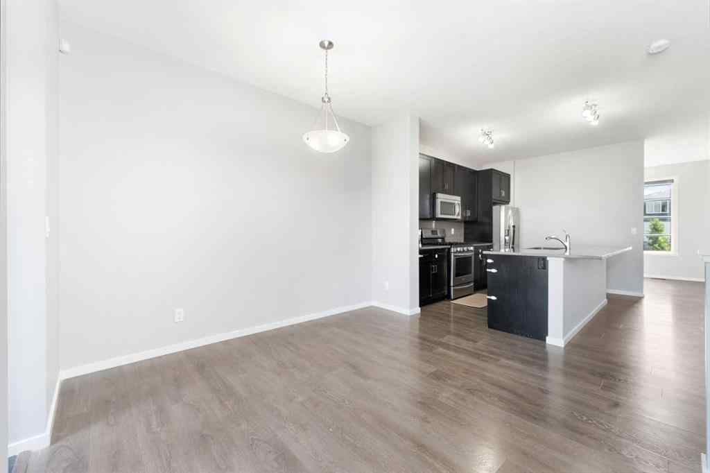 MLS® A2242367 - 9117 52 Street NE in Saddle Ridge Calgary, Residential
