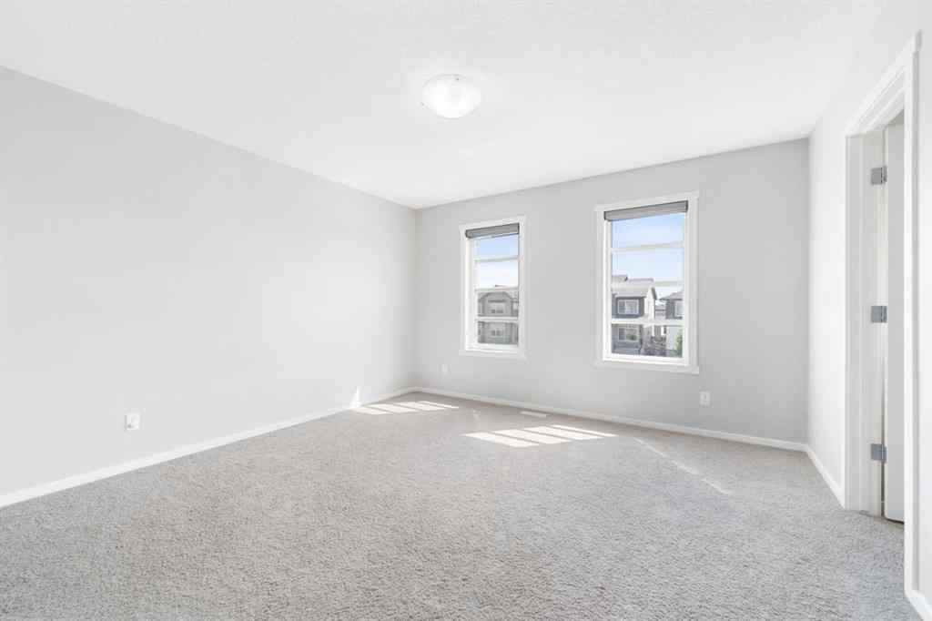 MLS® A2242367 - 9117 52 Street NE in Saddle Ridge Calgary, Residential