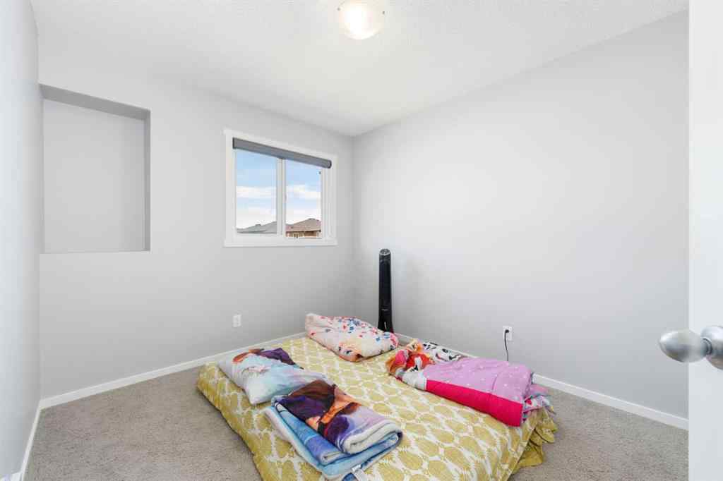 MLS® A2242367 - 9117 52 Street NE in Saddle Ridge Calgary, Residential
