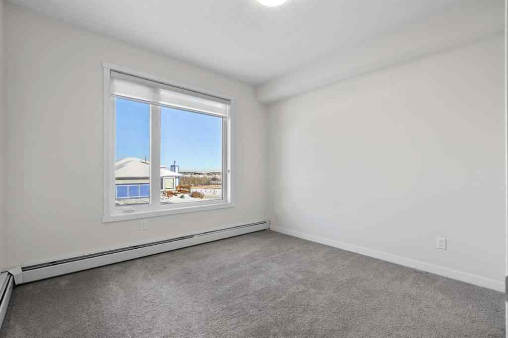 MLS® A2242372 - Unit #12 30 Shawnee Common SW in Shawnee Slopes Calgary, Residential