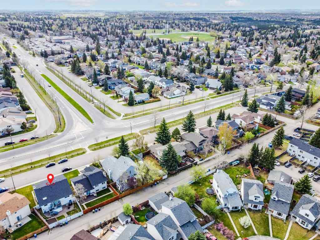 MLS® A2242388 - 31 Woodmont Way SW in Woodbine Calgary, Residential