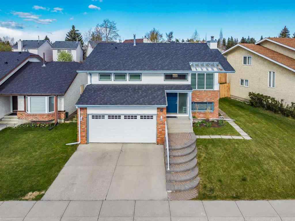 MLS® A2242388 - 31 Woodmont Way SW in Woodbine Calgary, Residential