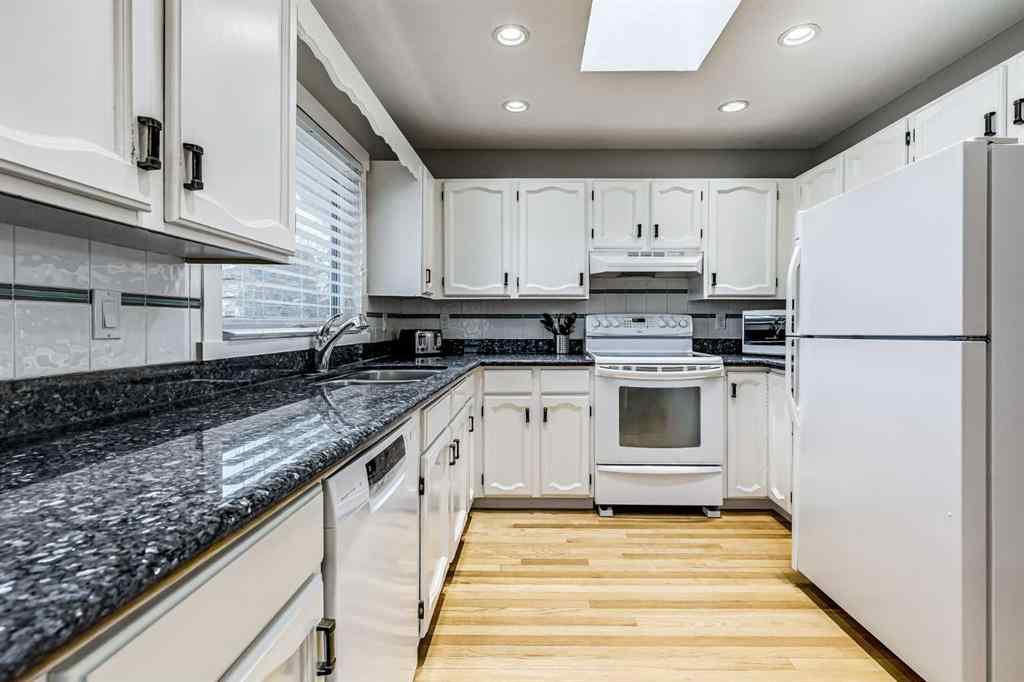 MLS® A2242388 - 31 Woodmont Way SW in Woodbine Calgary, Residential