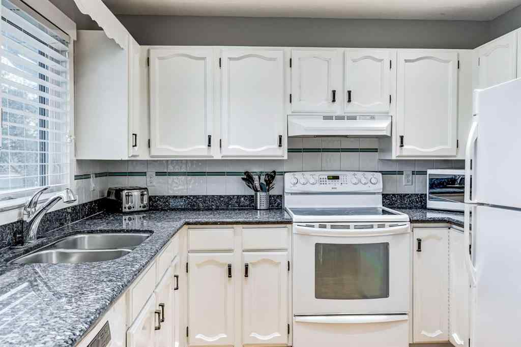 MLS® A2242388 - 31 Woodmont Way SW in Woodbine Calgary, Residential