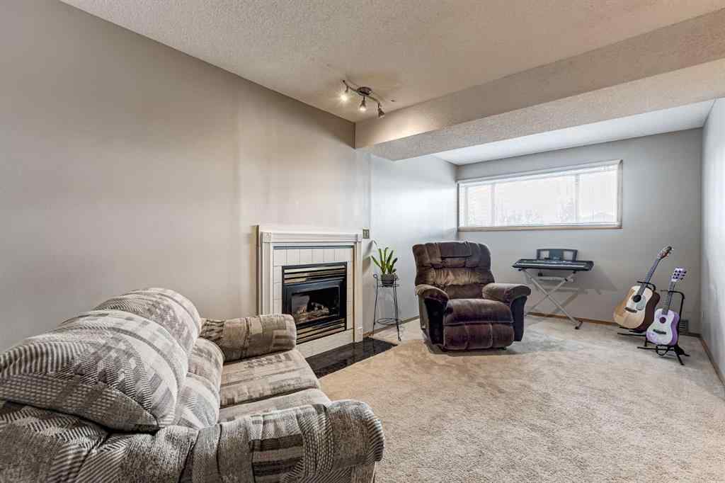 MLS® A2242388 - 31 Woodmont Way SW in Woodbine Calgary, Residential