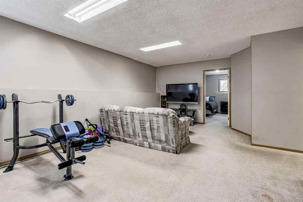 MLS® A2242388 - 31 Woodmont Way SW in Woodbine Calgary, Residential