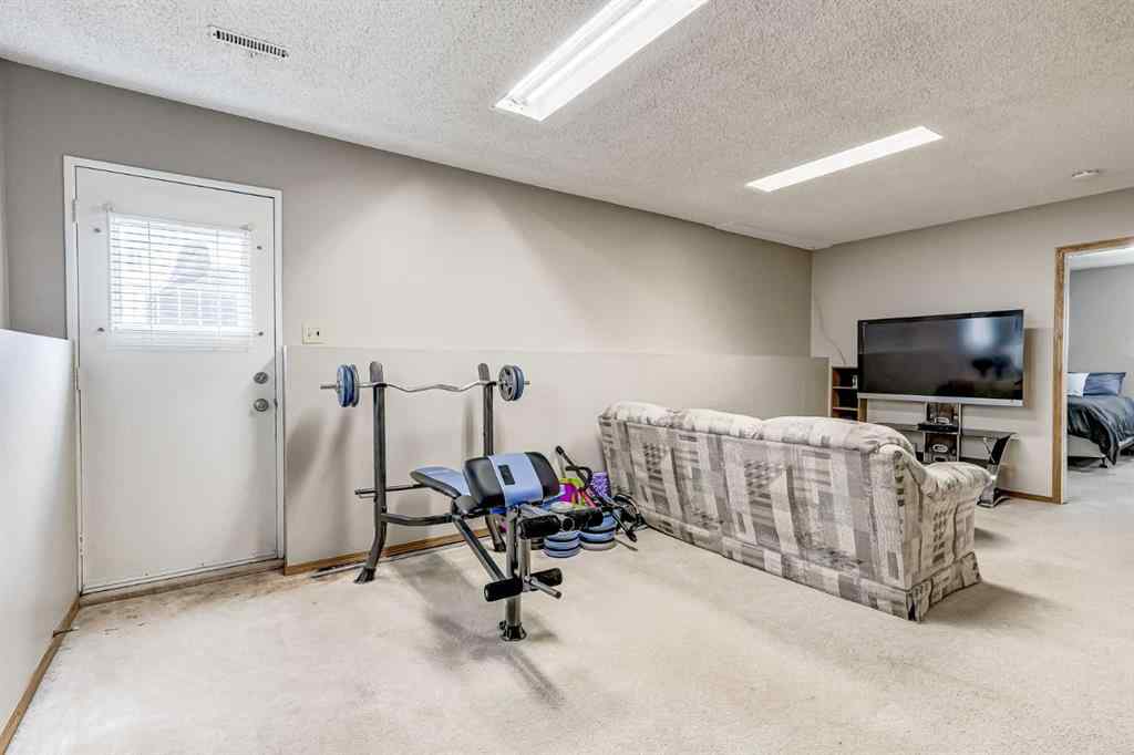 MLS® A2242388 - 31 Woodmont Way SW in Woodbine Calgary, Residential