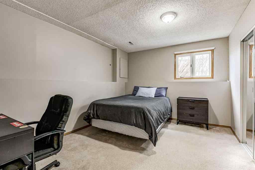 MLS® A2242388 - 31 Woodmont Way SW in Woodbine Calgary, Residential