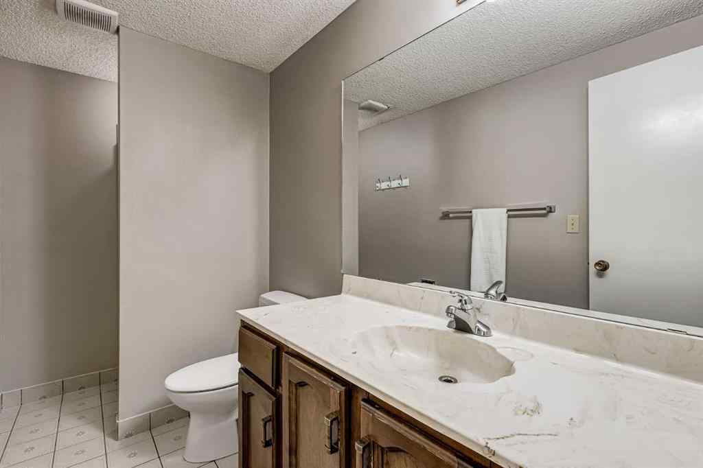 MLS® A2242388 - 31 Woodmont Way SW in Woodbine Calgary, Residential