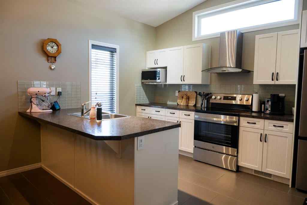 MLS® A2242392 - 887 Keystone Meadows W in Copperwood Lethbridge, Residential