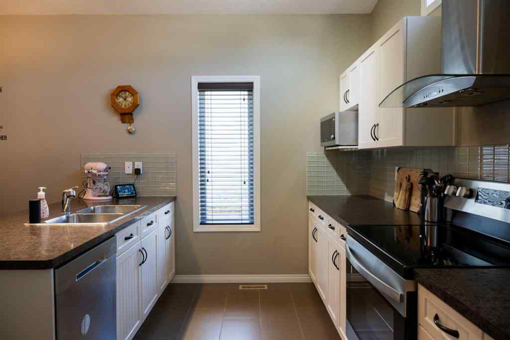 MLS® A2242392 - 887 Keystone Meadows W in Copperwood Lethbridge, Residential