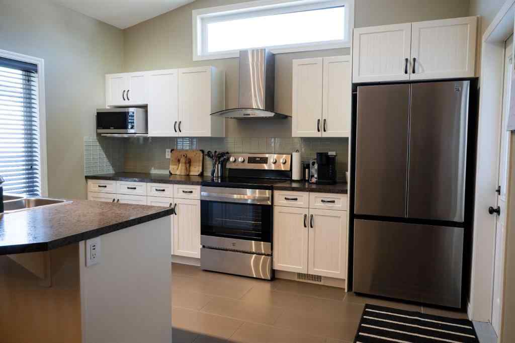 MLS® A2242392 - 887 Keystone Meadows W in Copperwood Lethbridge, Residential