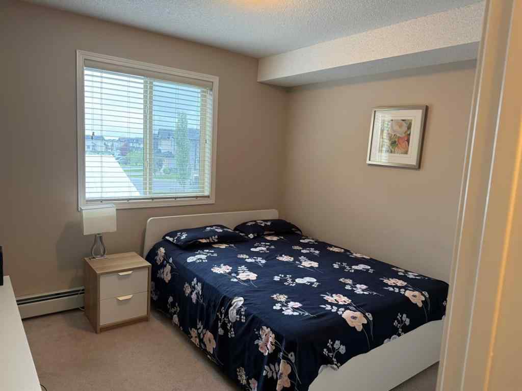 MLS® A2242394 - Unit #202 7210 80 Avenue NE in Saddle Ridge Calgary, Residential