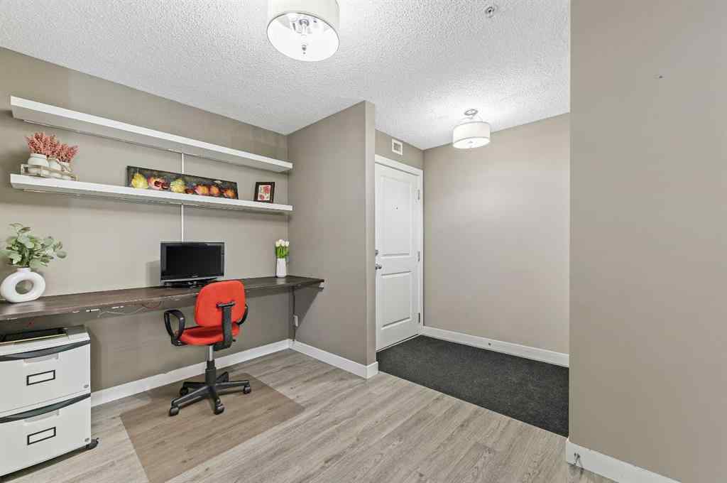 MLS® A2242399 - Unit #8113 403 Mackenzie Way SW in Downtown Airdrie, Residential