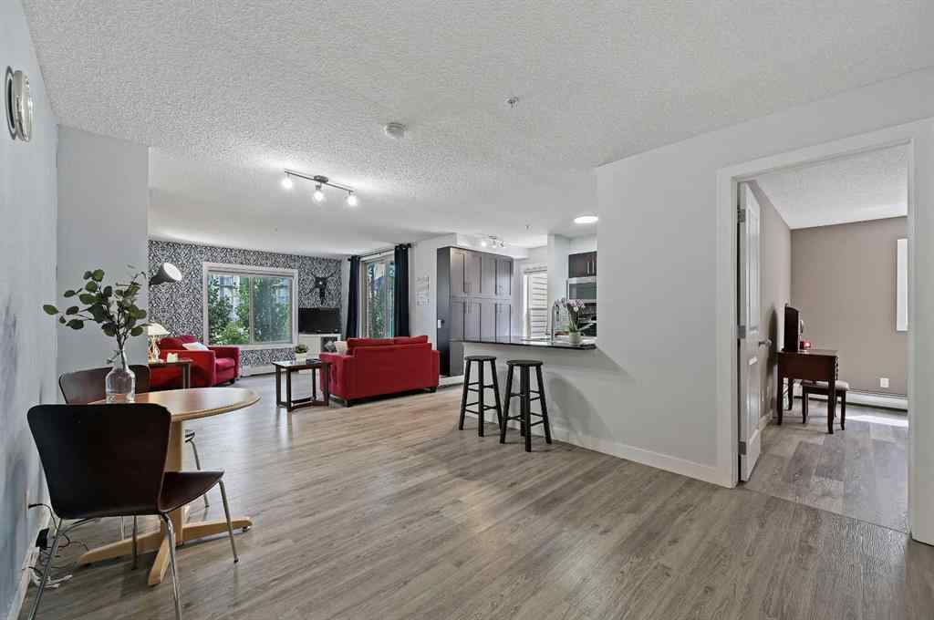 MLS® A2242399 - Unit #8113 403 Mackenzie Way SW in Downtown Airdrie, Residential
