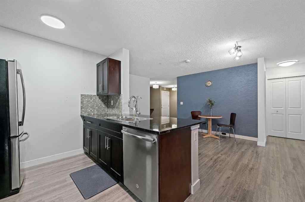 MLS® A2242399 - Unit #8113 403 Mackenzie Way SW in Downtown Airdrie, Residential