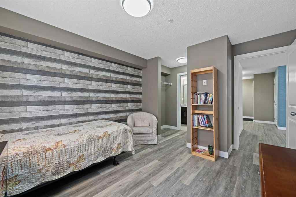 MLS® A2242399 - Unit #8113 403 Mackenzie Way SW in Downtown Airdrie, Residential