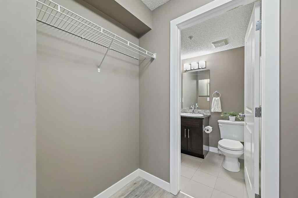 MLS® A2242399 - Unit #8113 403 Mackenzie Way SW in Downtown Airdrie, Residential
