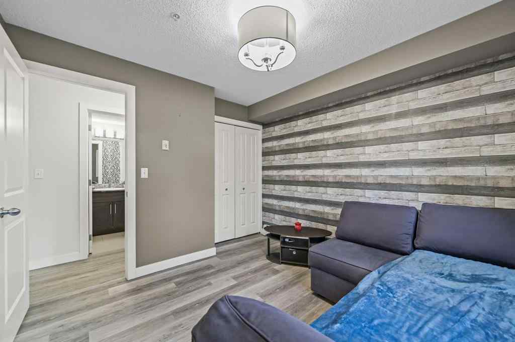 MLS® A2242399 - Unit #8113 403 Mackenzie Way SW in Downtown Airdrie, Residential