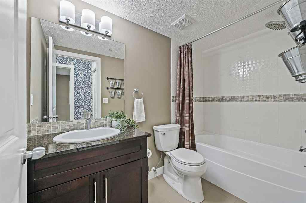 MLS® A2242399 - Unit #8113 403 Mackenzie Way SW in Downtown Airdrie, Residential