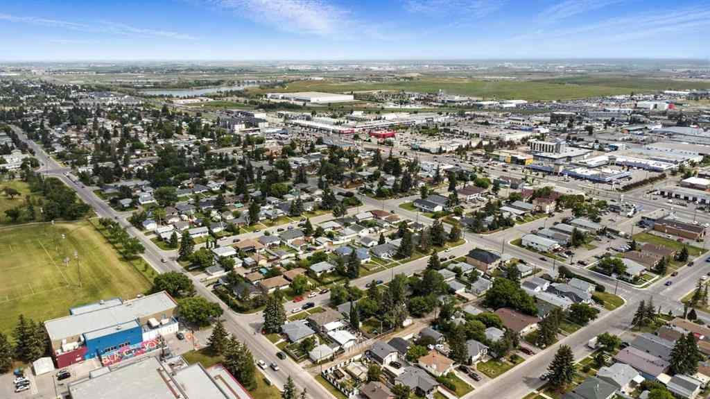 MLS® A2242445 - 4913 16 Avenue SE in Forest Lawn Calgary, Multi-Family