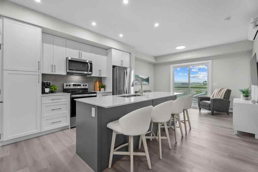 MLS® A2242447 - Unit #2406 100 Banister Drive  in Wedderburn Okotoks, Residential
