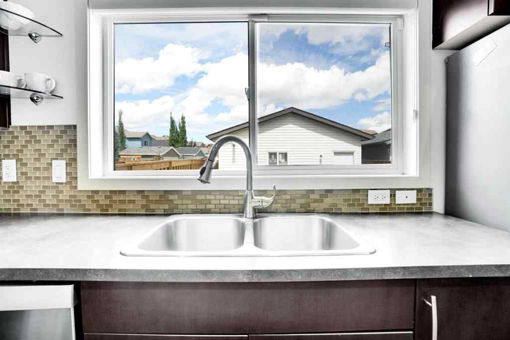 MLS® A2242459 - 1223 New Brighton Park SE in New Brighton Calgary, Residential