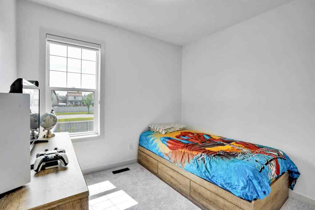 MLS® A2242459 - 1223 New Brighton Park SE in New Brighton Calgary, Residential