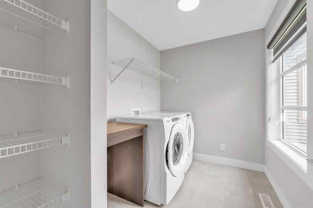MLS® A2242476 - 311 Lucas Way NW in Livingston Calgary, Residential