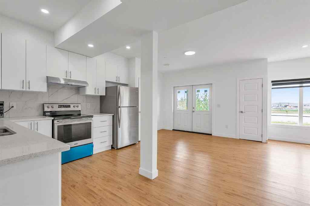 MLS® A2242476 - 311 Lucas Way NW in Livingston Calgary, Residential