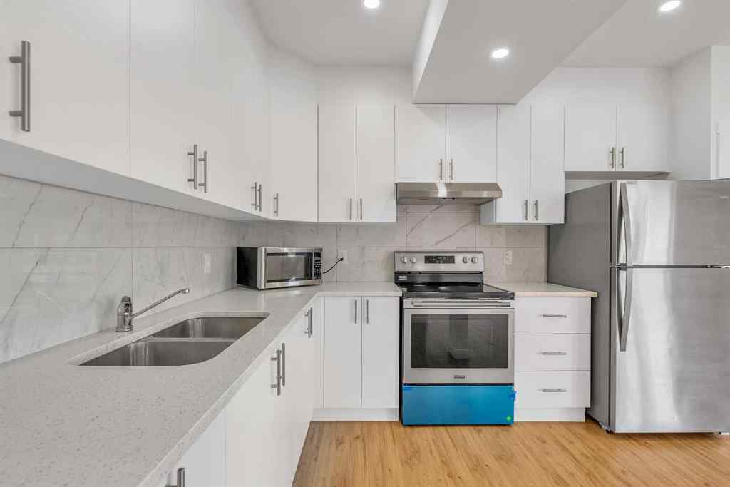 MLS® A2242476 - 311 Lucas Way NW in Livingston Calgary, Residential