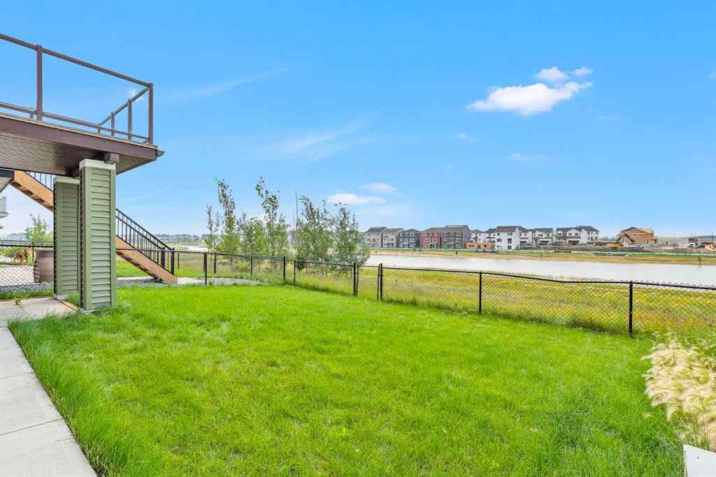 MLS® A2242476 - 311 Lucas Way NW in Livingston Calgary, Residential